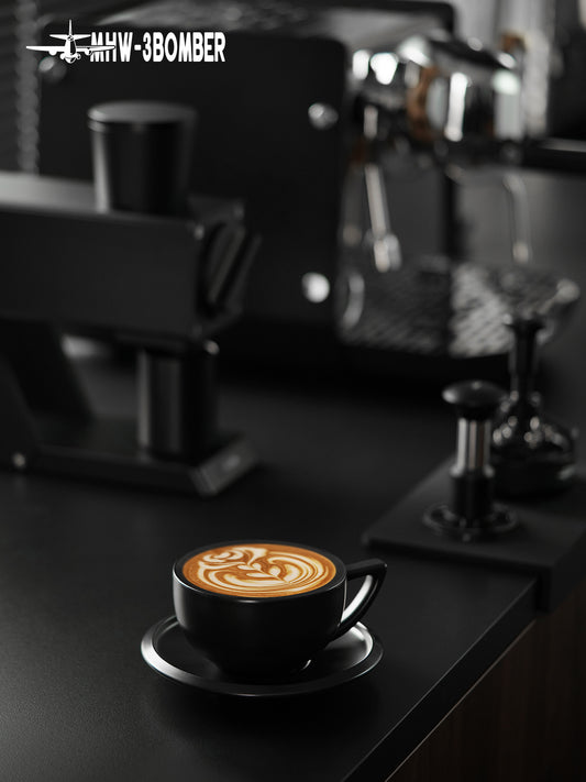 MHW-3BOMBER Sawada — 280 ml Serenity Black cup and saucer on a cafe counter; drinks, decoration and other tools are scene props
