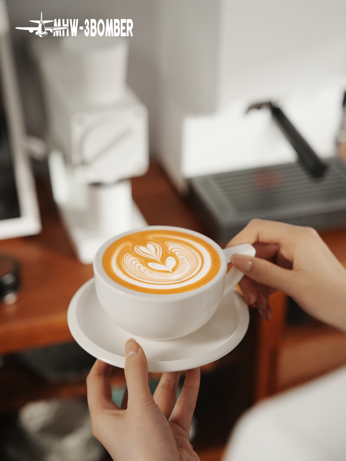 MHW-3BOMBER Sawada — 280 ml Mineral White cup and saucer held by the handle; drinks, decoration and other tools are scene props
