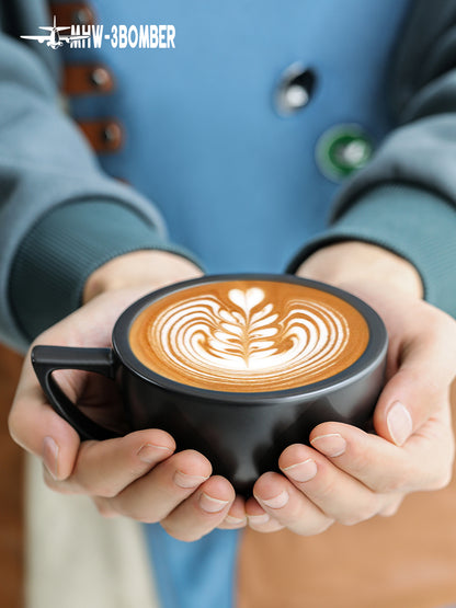 MHW-3BOMBER Sawada — 280 ml Serenity Black cup held in both hands; drinks, decoration and other tools are scene props
