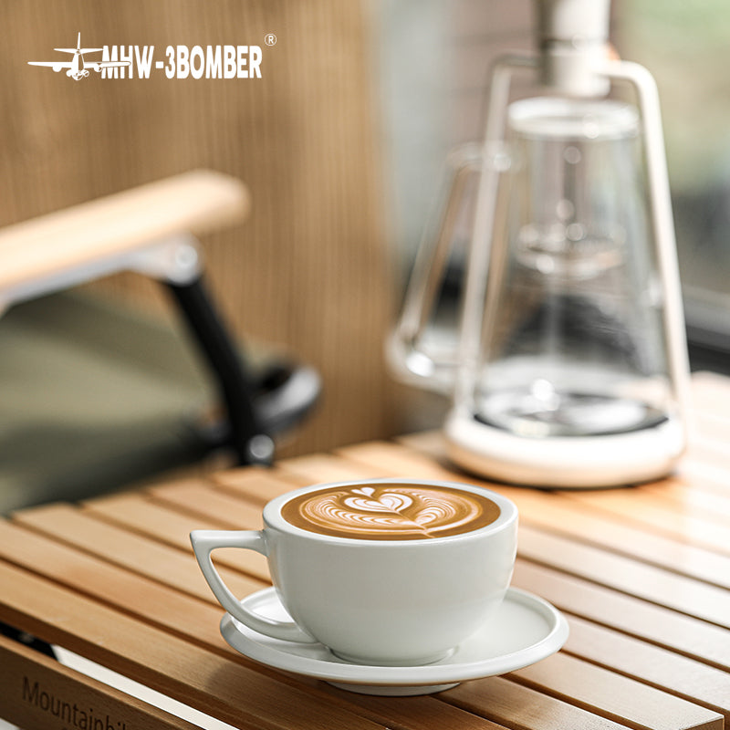MHW-3BOMBER Sawada — 280 ml Mineral White cup and saucer on an outdoor wooden table; drinks, decoration and other tools are scene props