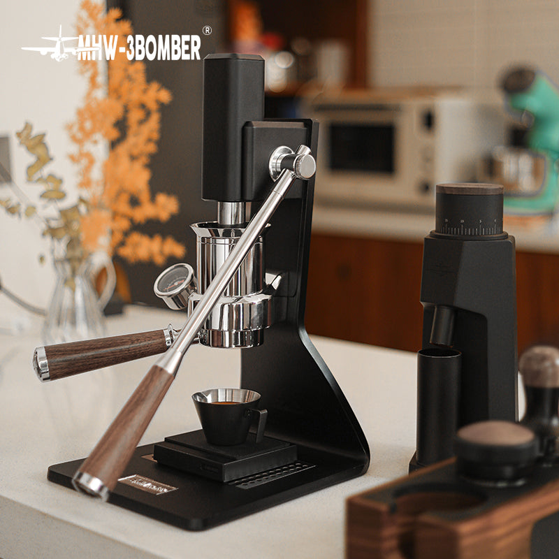MHW-3BOMBER Sonic S7 CM8011 machine on a counter; surrounding grinder and tools are props