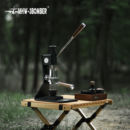 MHW-3BOMBER Sonic S7 CM8011 base machine outdoors; table and preparation tools are props