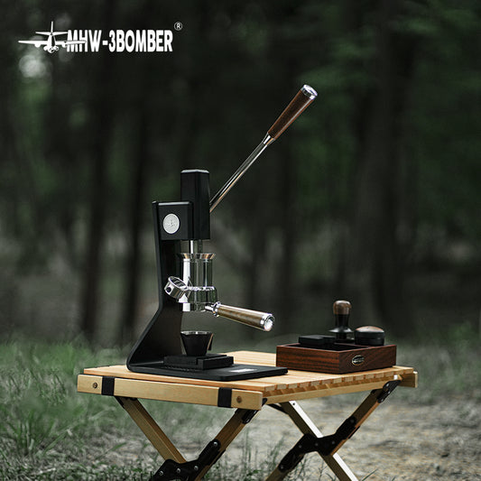 MHW-3BOMBER Sonic S7 CM8011 base machine outdoors; table and preparation tools are props
