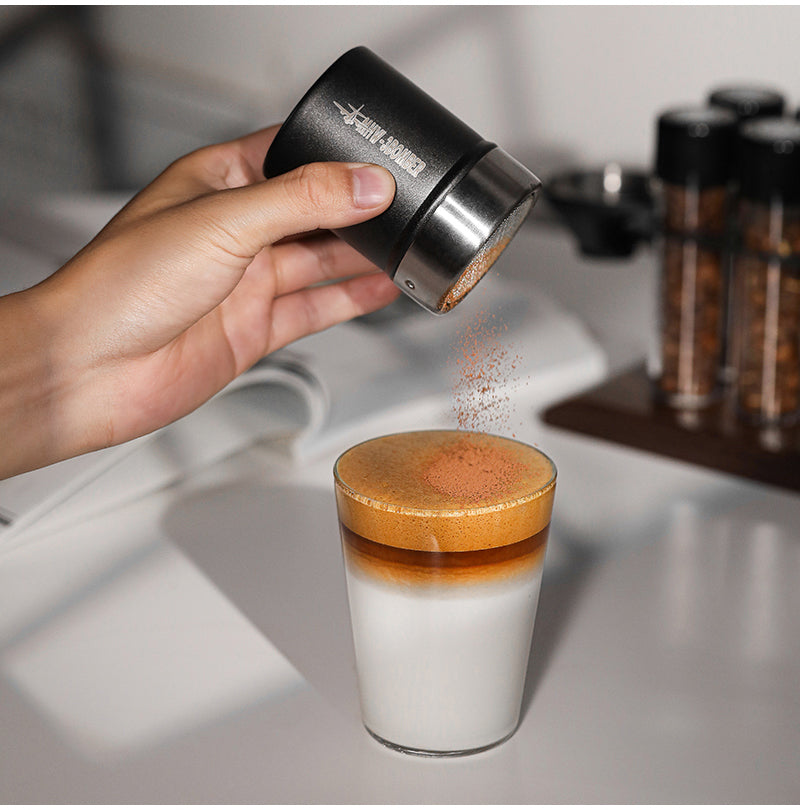 MHW-3BOMBER SP5366B matte black shaker above a prepared glass drink