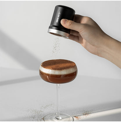 MHW-3BOMBER SP5693B black powder shaker used above a prepared drink