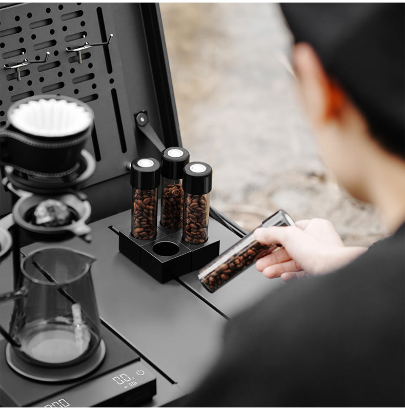 MHW-3BOMBER SR6680 magnetic blocks supporting separate coffee tubes at a brewing station