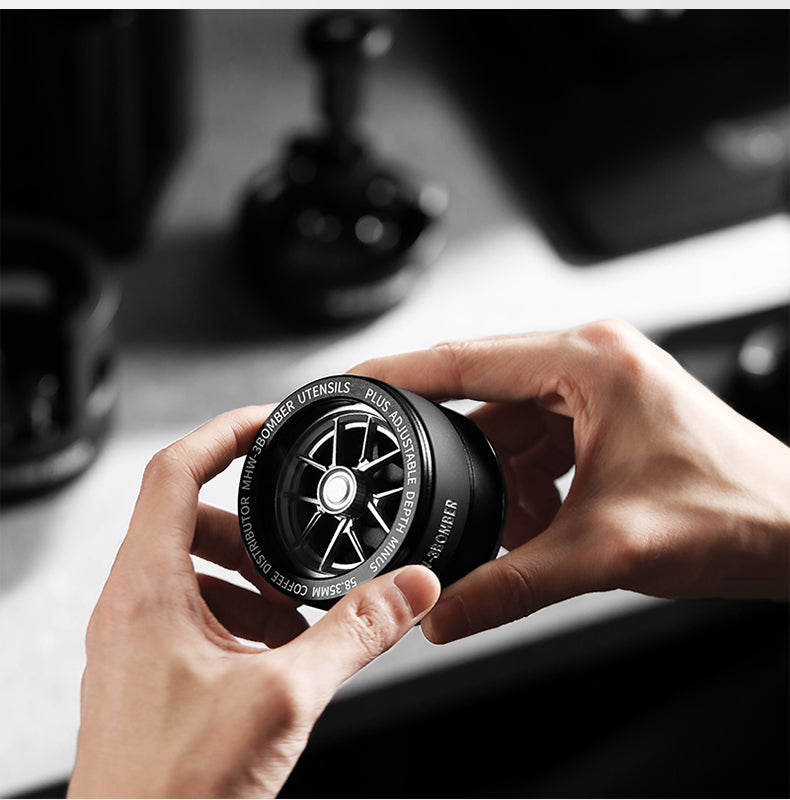 MHW-3BOMBER wheel-style top of the Yu distributor viewed in the hands