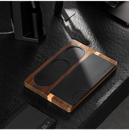 MHW-3BOMBER wood tamping base standing on a coffee counter