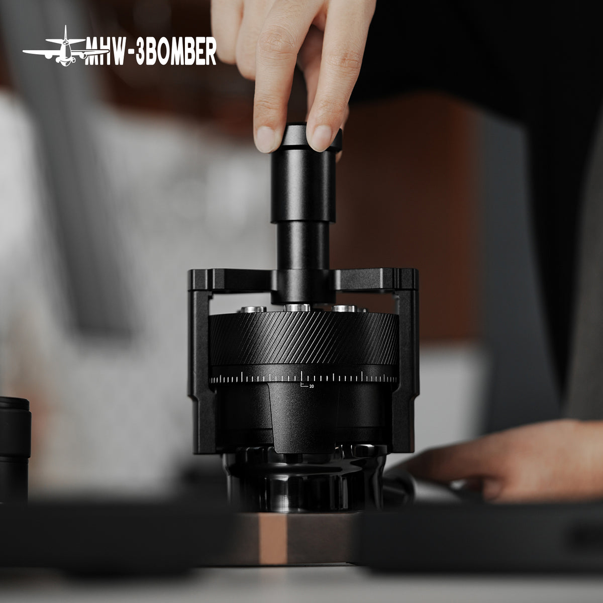 MHW-3BOMBER T5579 SE Pro WDT tool being pressed above a portafilter