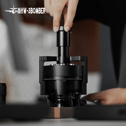 MHW-3BOMBER T5579 SE Pro WDT tool being pressed above a portafilter
